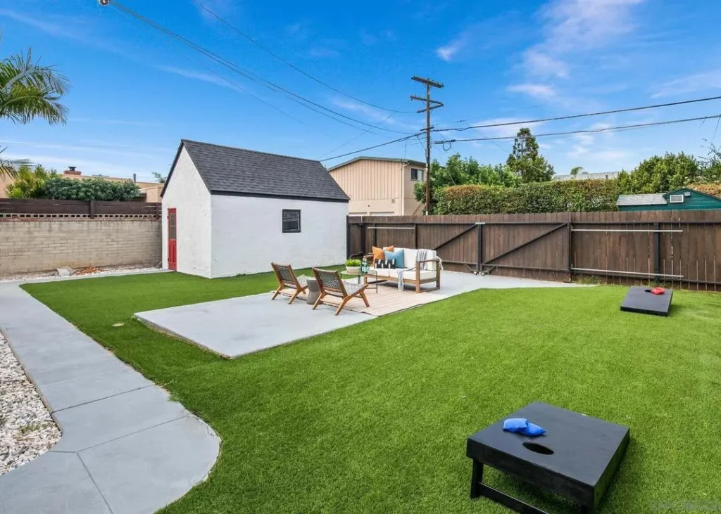 Backyard With Artificial Turf And Pergola Kensington Home Remodel